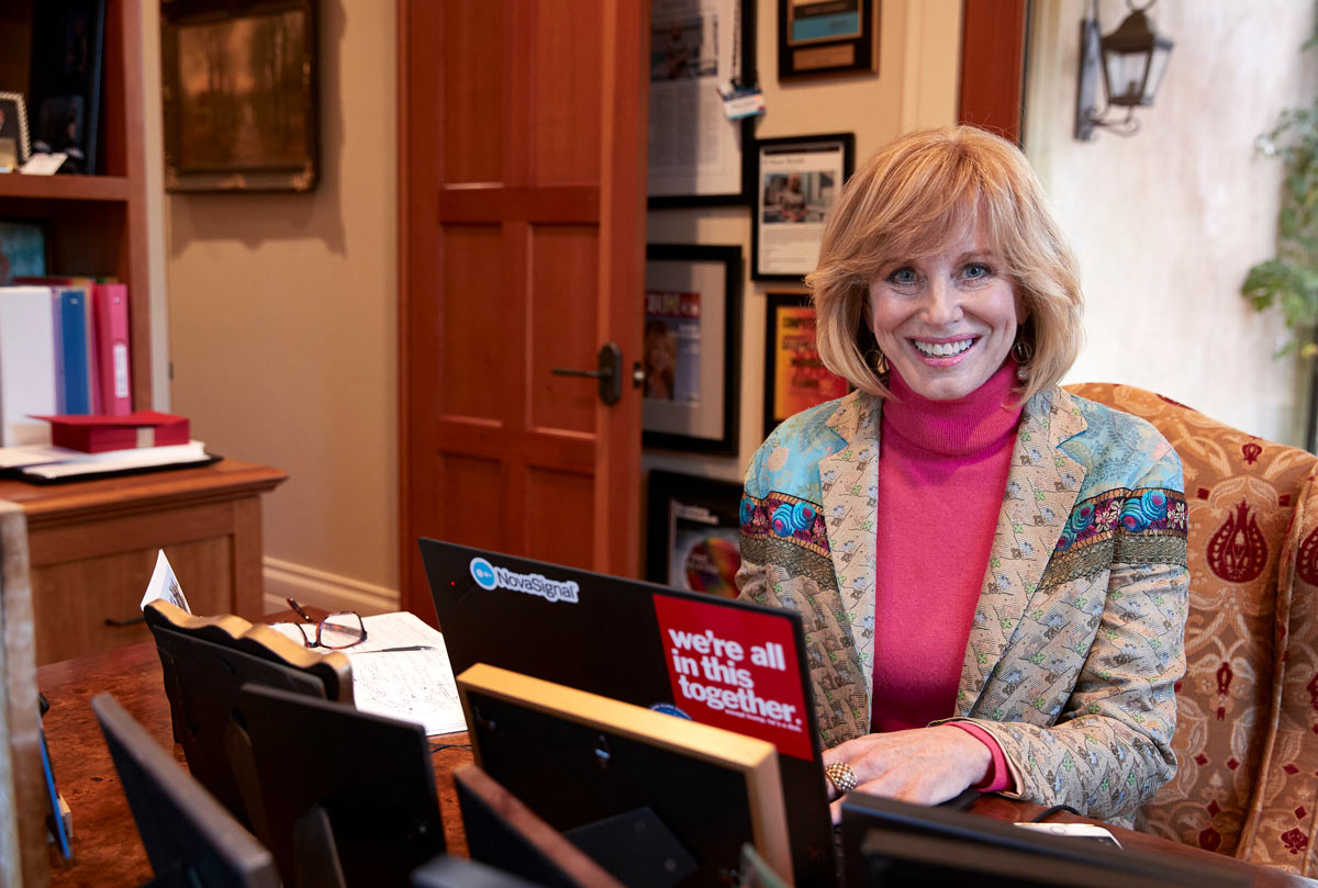 Diane Bryant nenvironmental, with laptop