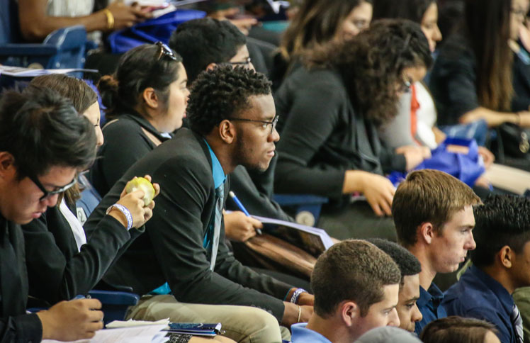 students listening to speaker