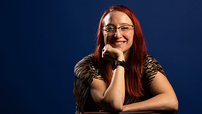 Cassondra Brayfield in front of a blue background