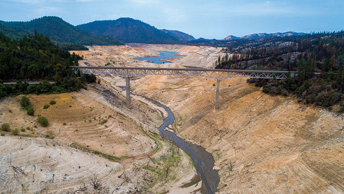 Dry waterway with a bridge crossing