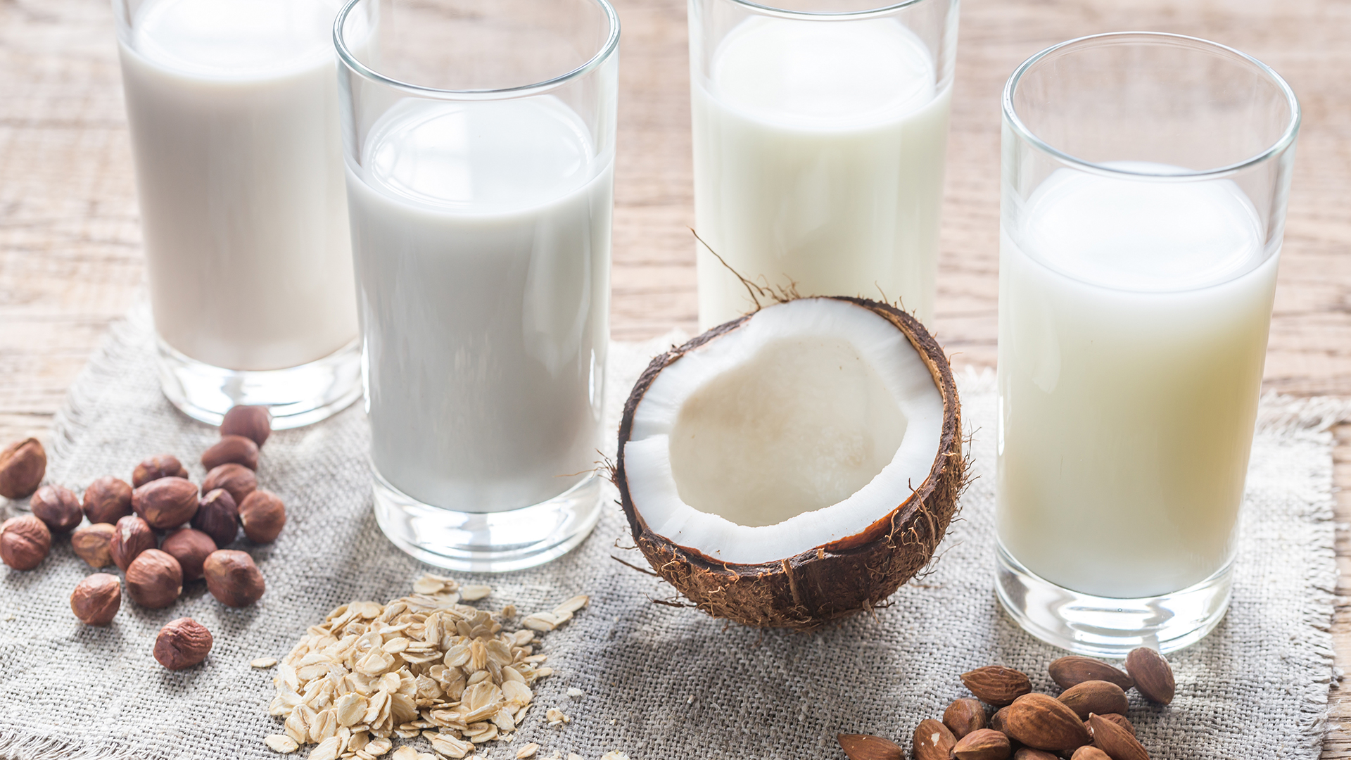 Variety of plant-based milks on a table