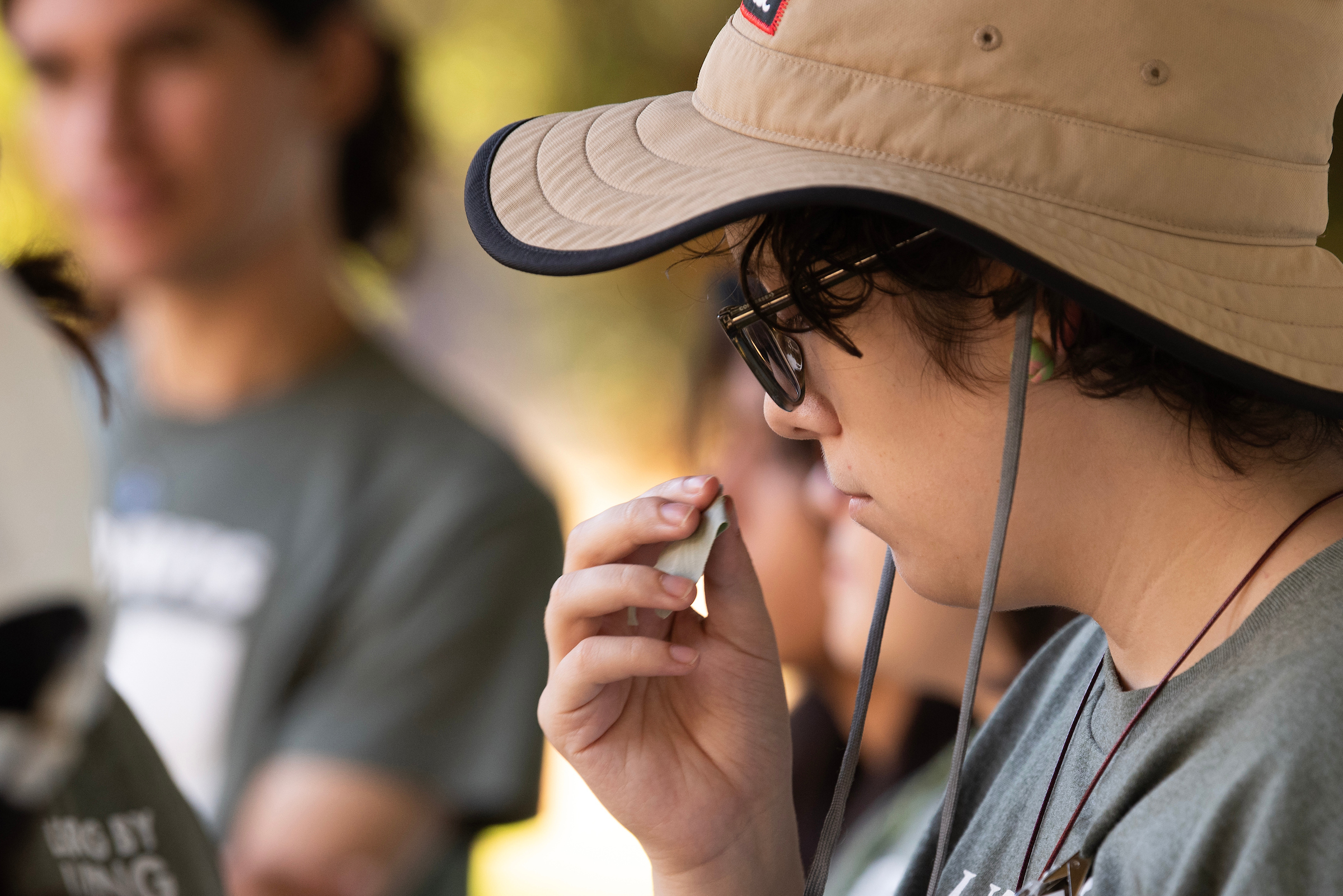 Isabel Garcia smells sage in Gorman Native American garden.