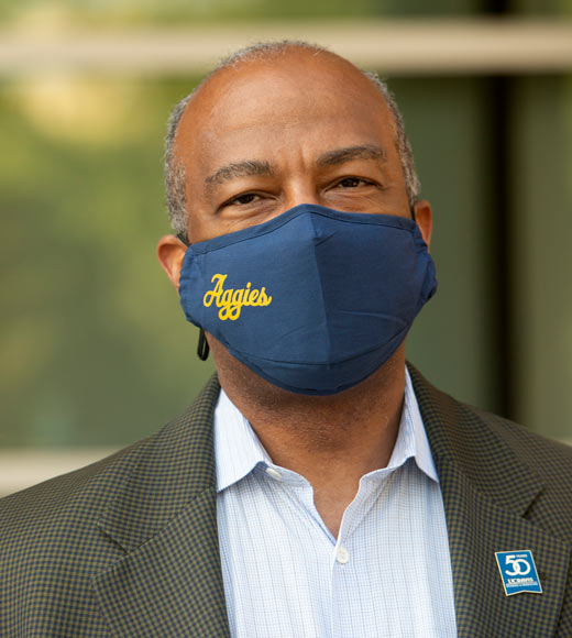 Chancellor Gary S. May in Aggies face mask.