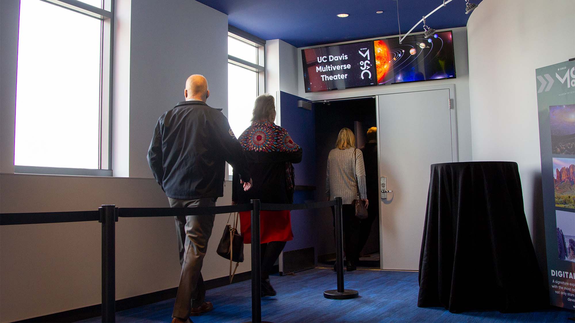 People walk into the entrance of the UC Davis Multiverse Theater