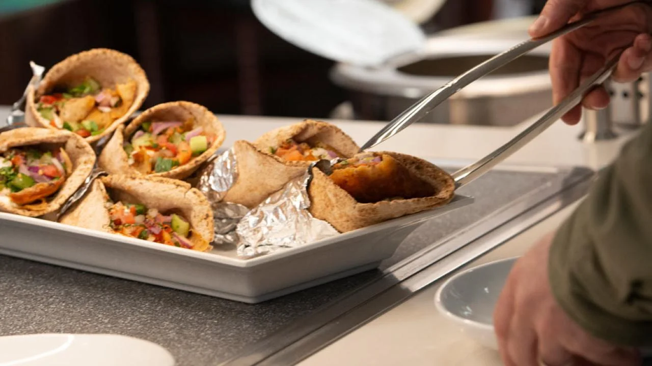 a selection of eggrolls on a platter