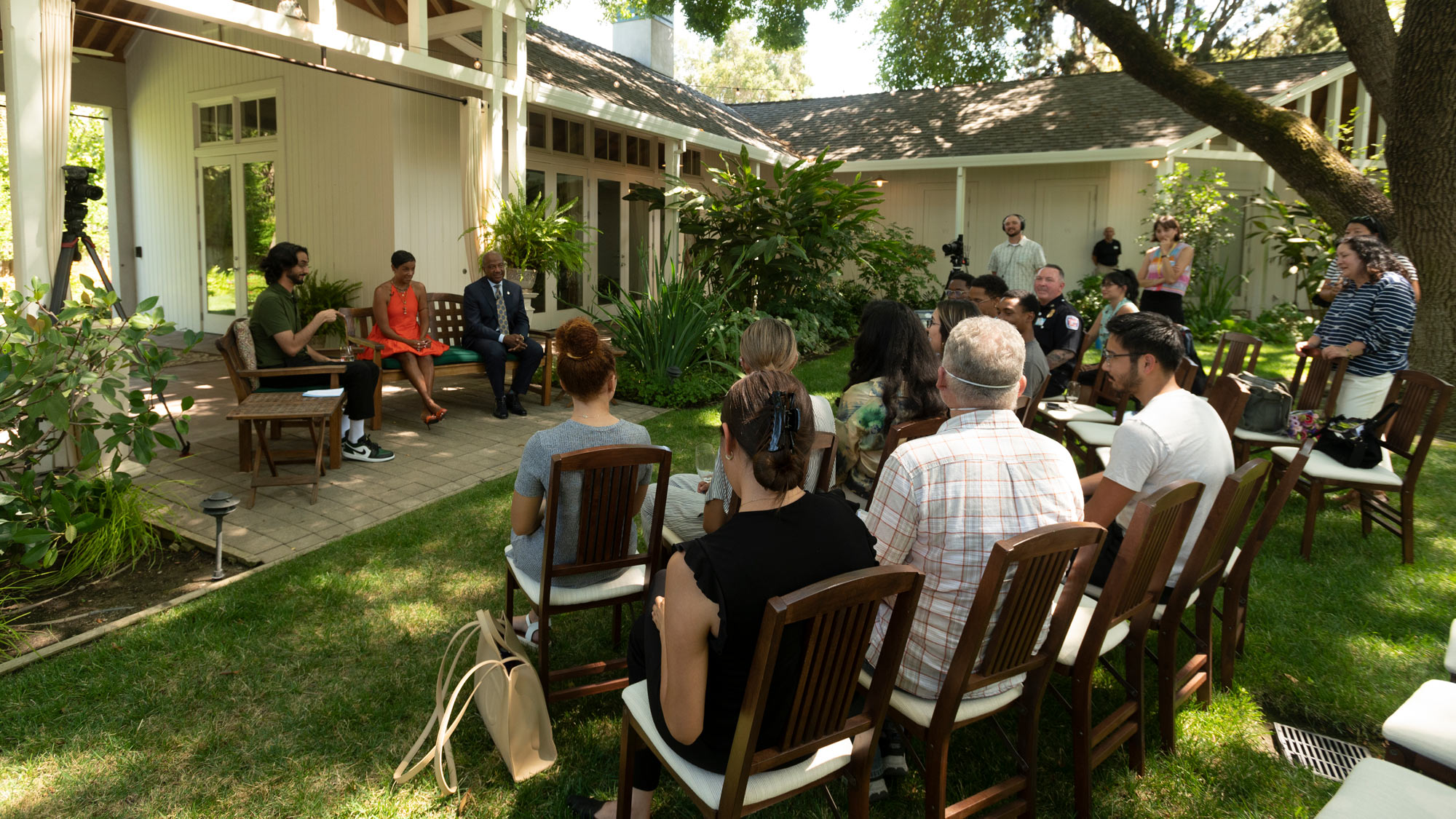 Wide shot of "thursday Thoughts" recording with audience