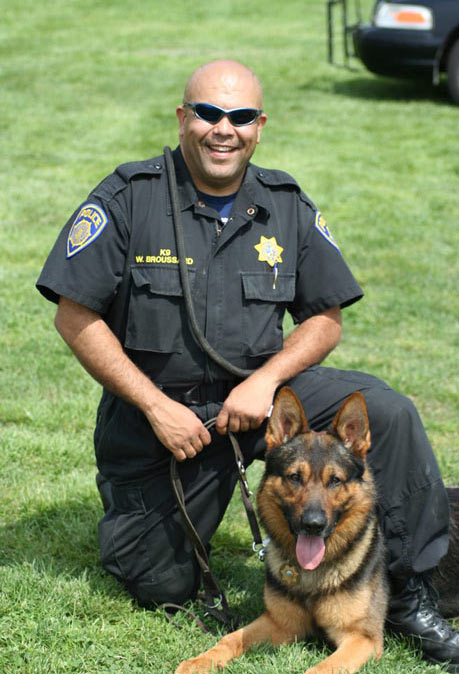 Police officer and K-9 German shepherd