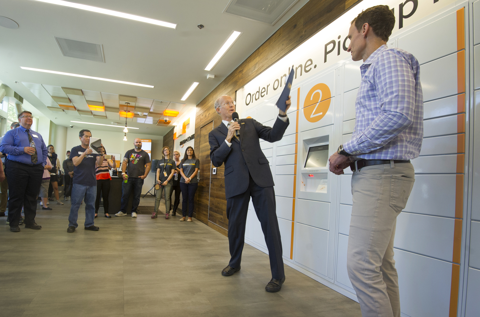 Interim Provost Ken Burtis celebrates the grand opening of Amazon@UC Davis.