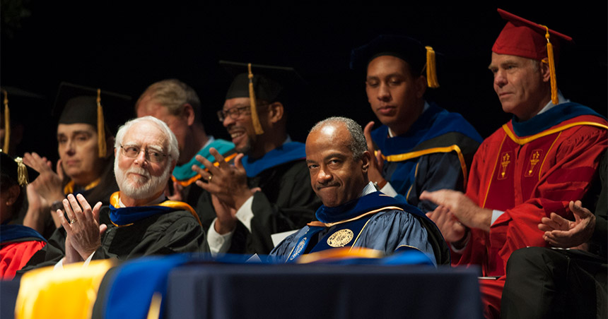 G. Wayne Clough sits next to Gary S. May