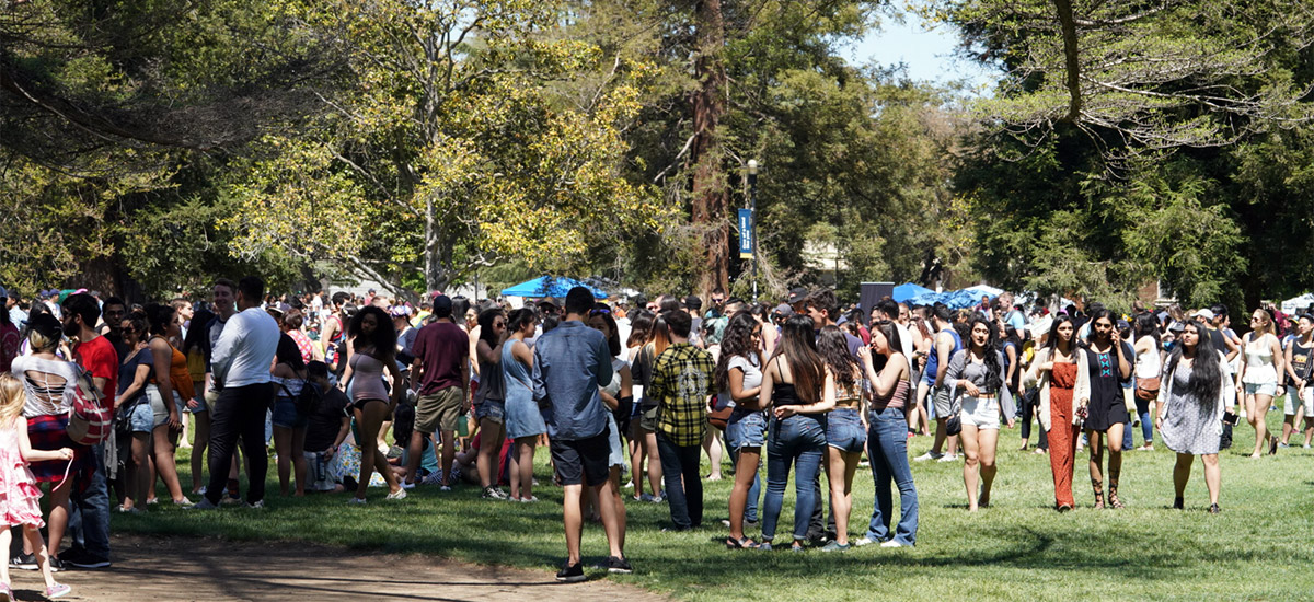 Crowd of people on Quad during Picnic Day.