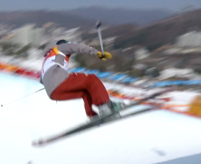 Brita Sigourney flies above halfpipe.