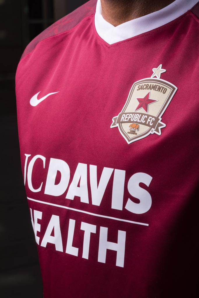 Sac Republic FC red jersey with "UC Davis Health"