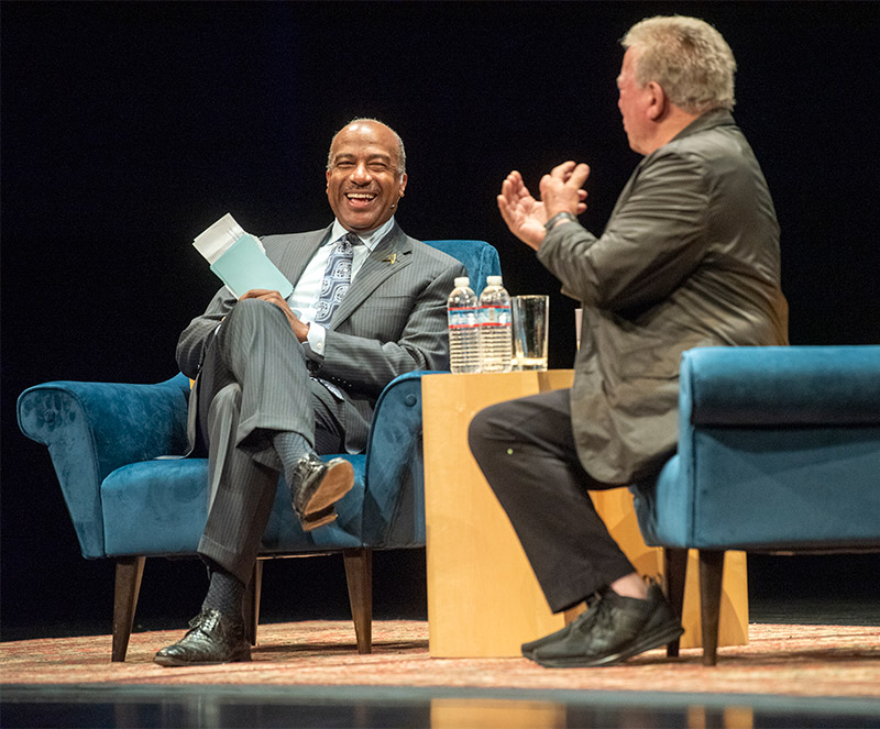 Chancellor Gary S. May and William Shatner on stage.