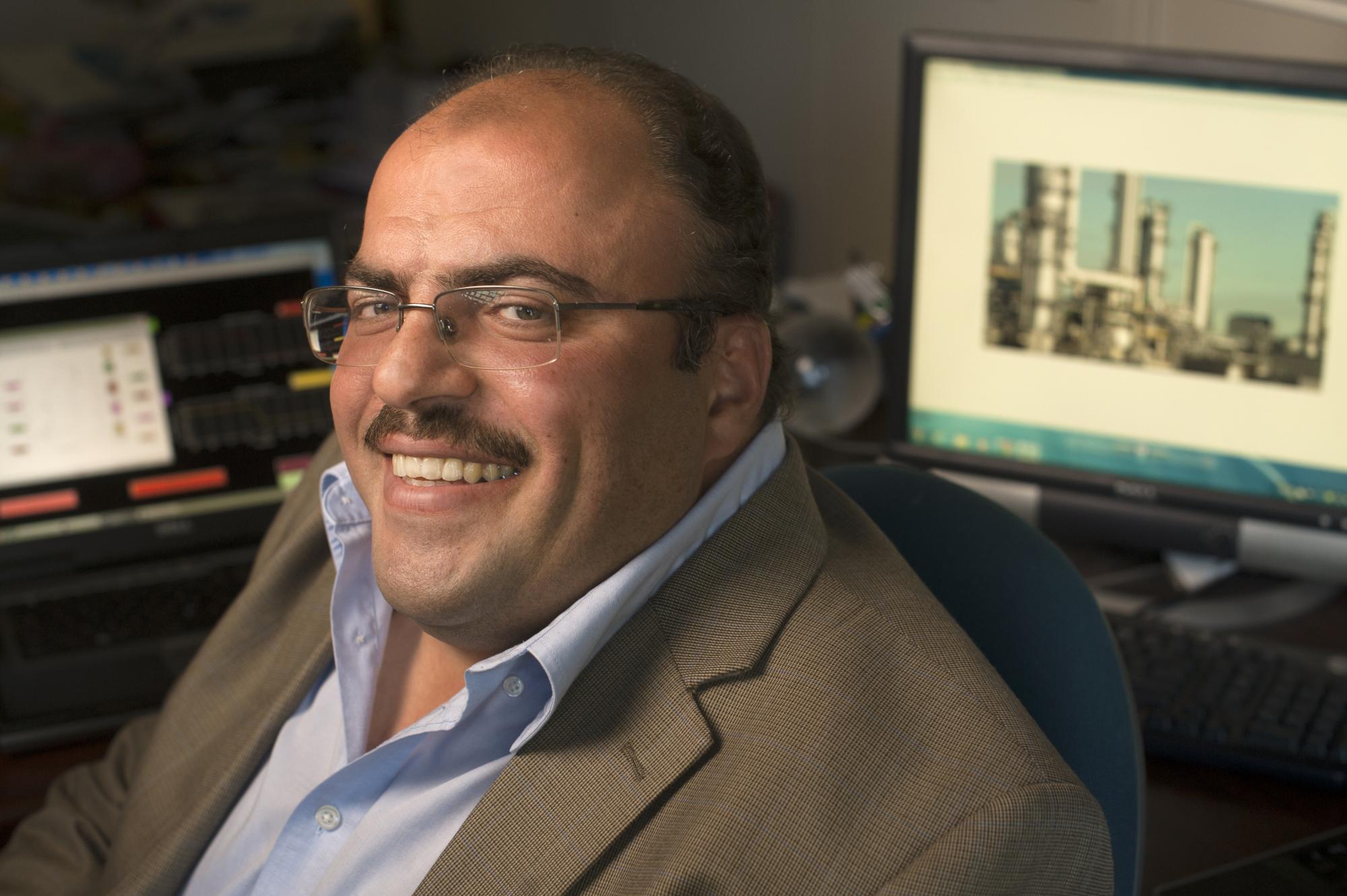 A male professor in his office