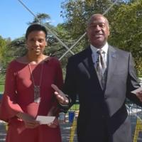 Chancellor May and LeShelle standing in the MU patio