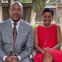 Chancellor May and LeShelle seated on a bench outside the Residence in a place called the Lana'i