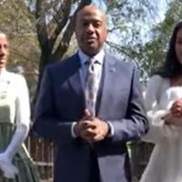 Chancellor Gary May, LeShelle, and Simone standing on Love Lock bridge in the UC Davis Arboretum