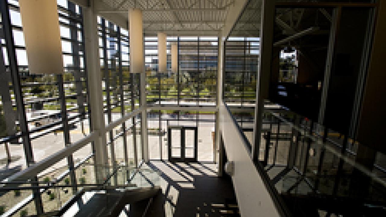 The foyer in the Graduate School of Managements Gallagher Hall features tall windows that maximize natural daylight and motion-sensitive lighting controls in every room. Overall, the building is 30 percent more efficient than a typical office b