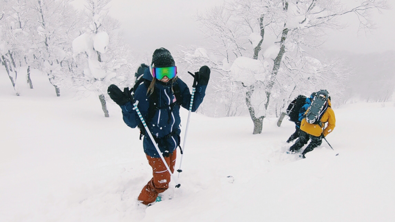 Brita Sigourney in North Face uniform, in snow in Japan, pre-Olympics