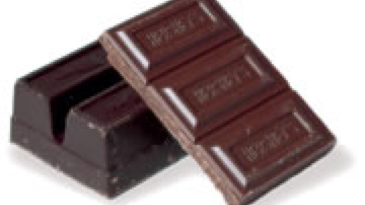 Photo: Chocolate candies coming off the assembly line.