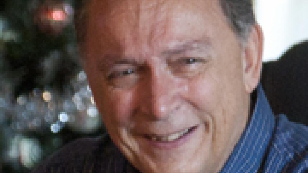 Photo: Gary Colberg, in front of the family Christmas tree Jan. 4 at his home