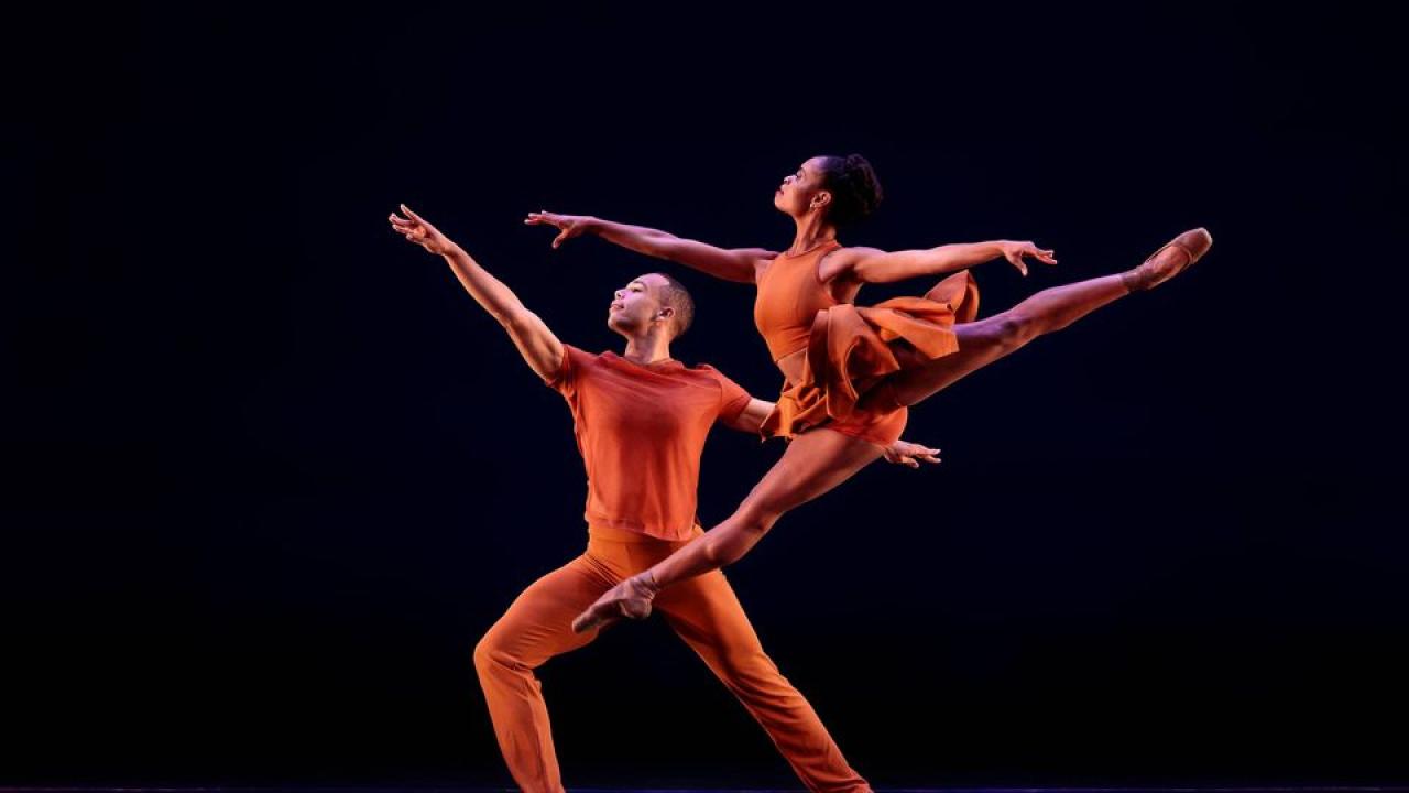 dancers in orange