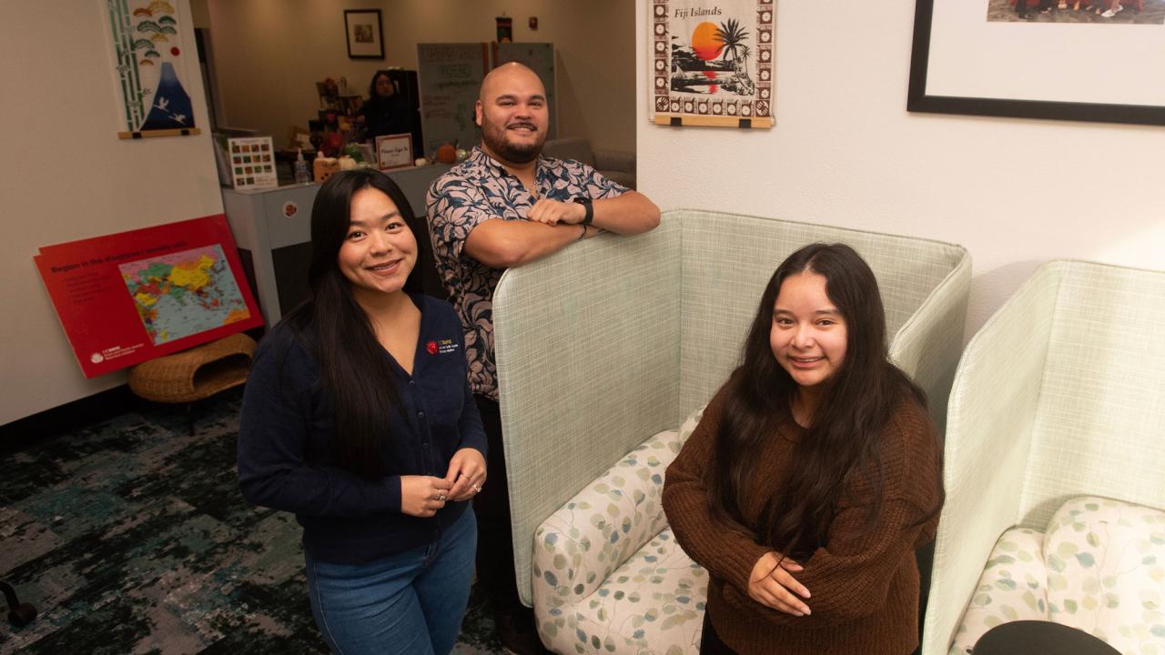 Melissa Segura, right, stands with two mentors in the Lotus Mana Center