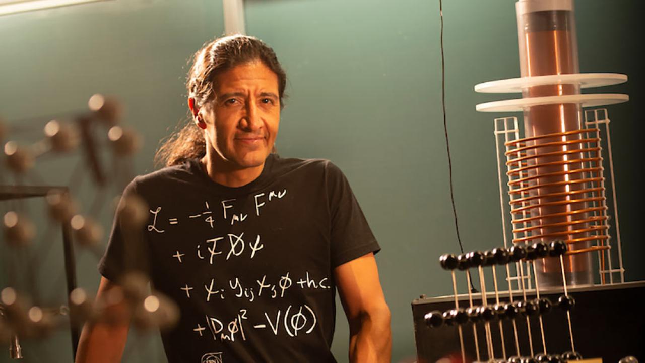 A male UC Davis professor poses in his lab