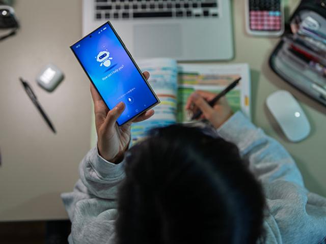 A teen uses an AI chatbot