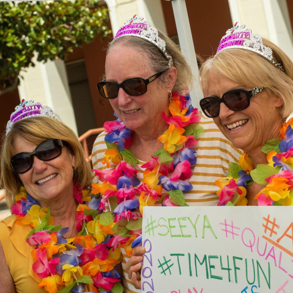 Three UC Davis staff members celebrate their retirement with a party outside of Mrak Hall