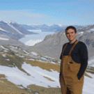 Gary Acton in November 2007 with the Taylor Glacier in the background and with the Antarctic ice sheet in the far distant background.