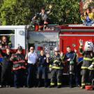 Guess the Weight contest photo: Firetruck, 16 people and Sparky the Fire Dog