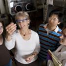 Chemistry professor Susan Kauzlarich, second from left, works with students in her campus laboratory. 