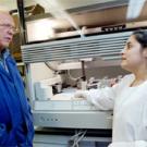 The director of the Center for Vectorborne Diseases, John Edman, talks with staff research associate Nicole Kahl, who&rsquo;s been working with samples of RNA from birds to help keep tabs on West Nile virus. The center has confirmed the presence of 