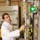 photo of Paul Erickson working in his lab coat