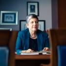 Janet Napolitano behind desk