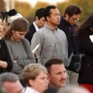Medical students Jolene Chang, Alison Russell, David Law and Roxanne Aga join others in observing a moment of silence during last week&rsquo;s Donated Body Program memorial. Later, Danit Ariel of the class of 2007 takes part in the memorial tree-pla