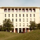 Photo: Mrak Hall exterior, two Eggheads in front (south side).