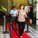 Myrna Malqued walks along red carpet.