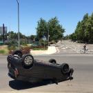 A rolled car at La Rue and Dairy roads.