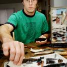 Mark Salak shows off some of the tools and arrowheads associated with his trade &mdash; or at least one of his trades. The Craft Center instructor, Davis resident and simple-life devotee is considered among the world&rsquo;s finest obsidian knappers.