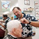 John Salido coifs the hair of Emanuel Epstein, an emeritus professor of Land, Air and Water Resources, who has been having his hair cut by Salido for more than 30 years.  &ldquo;What&rsquo;s on top of the head is never as good as what&rsquo;s inside,&rdquo; Eps