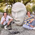 Discovering Academia podcast hosts pictured outside on campus