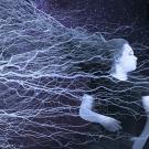 An artwork of silhouette of a girl with flowing hair against a starry sky and lightning-like patterns.