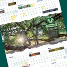 Calendar pages with sunlight-dappled oak tree photo and monthly grids