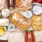 Assorted nonperishable foods: canned goods, jars, pasta, rice, and cooking oil
