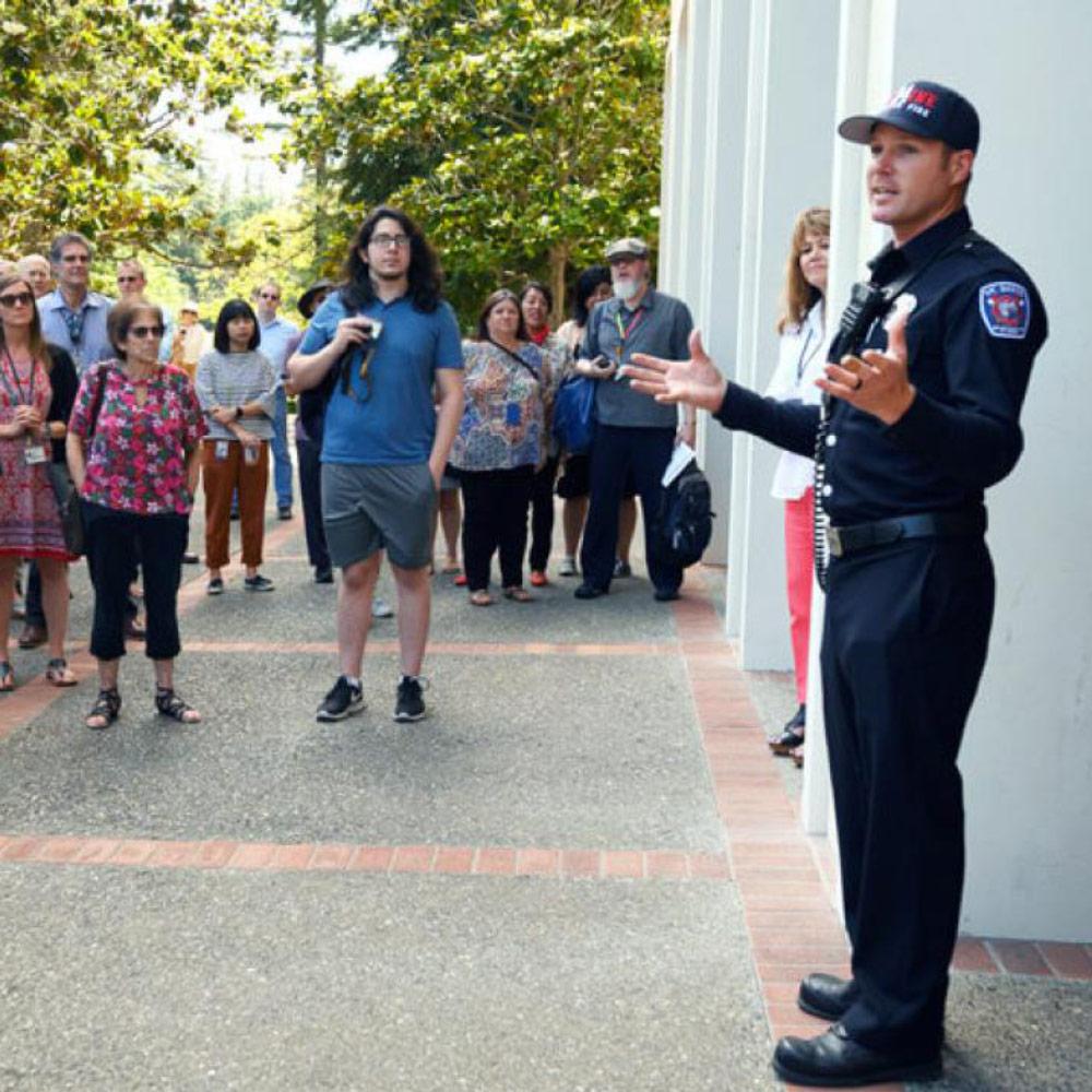 An officer explains emergency protocol