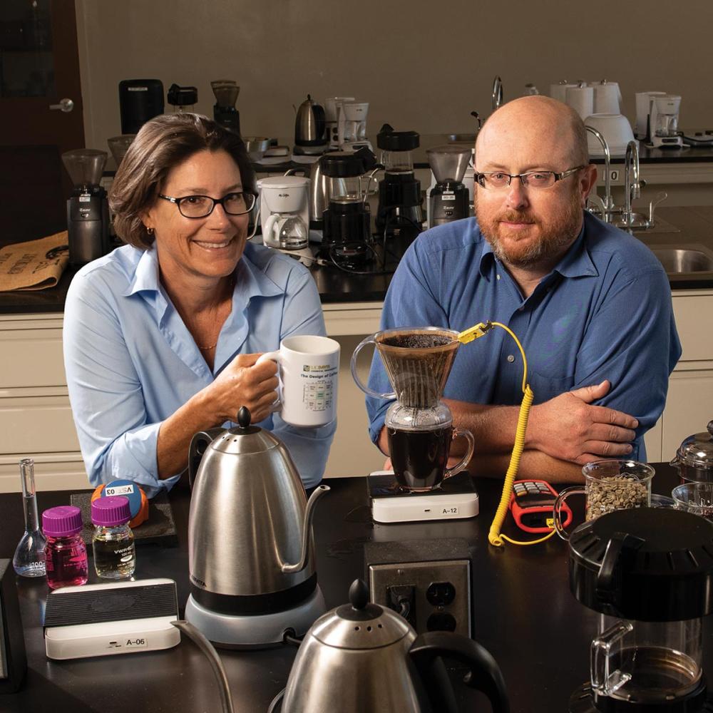 two professors tasting coffee in the UC Davis coffee lab