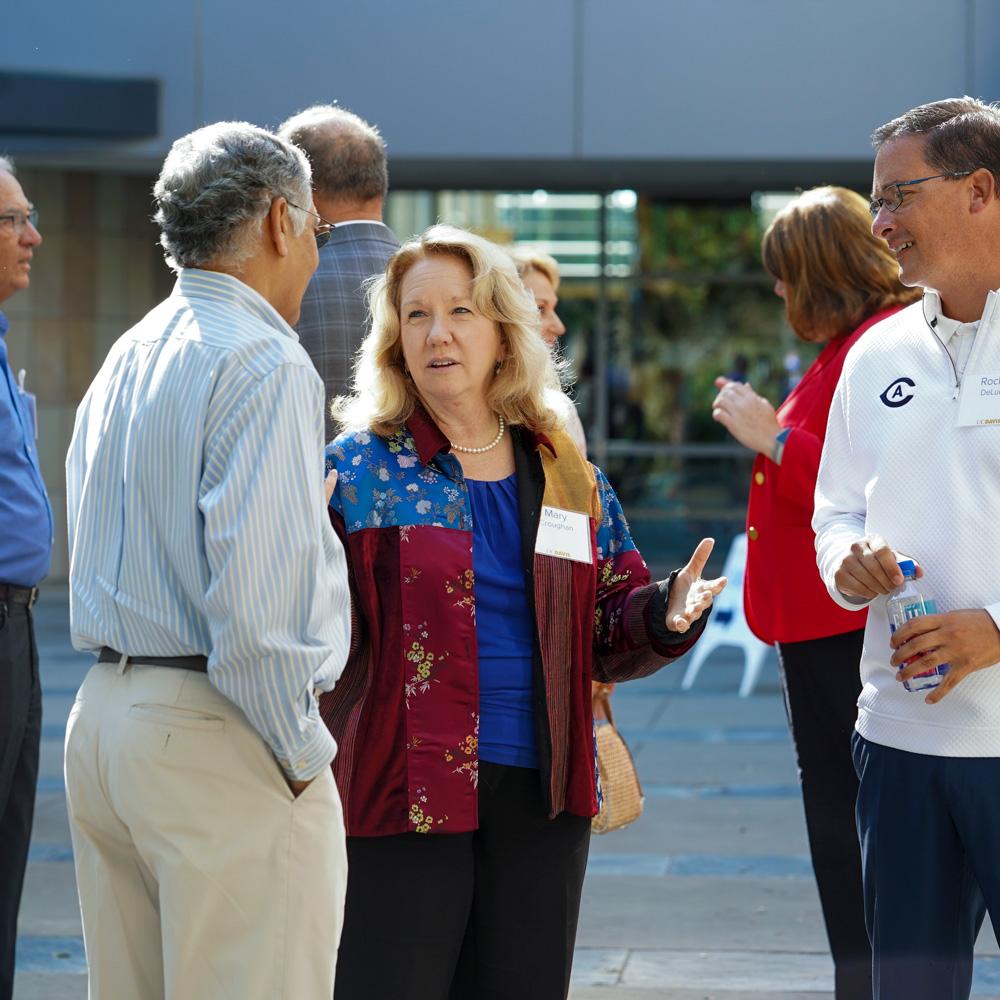 Provost chatting with a vice chancellor